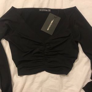 Black off the shoulder long sleeve crop top